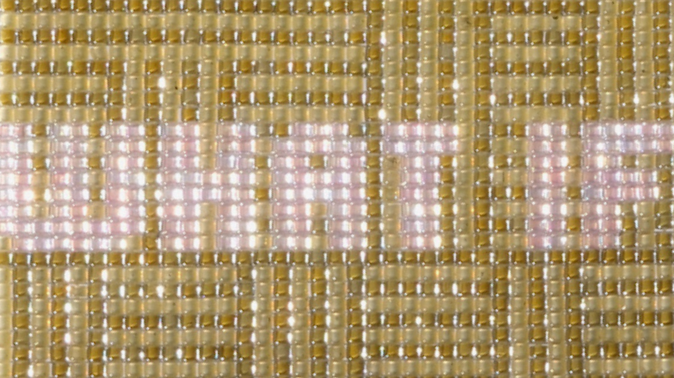 Steph Everett textile artwork made of glass beads with text that reads 'what if'